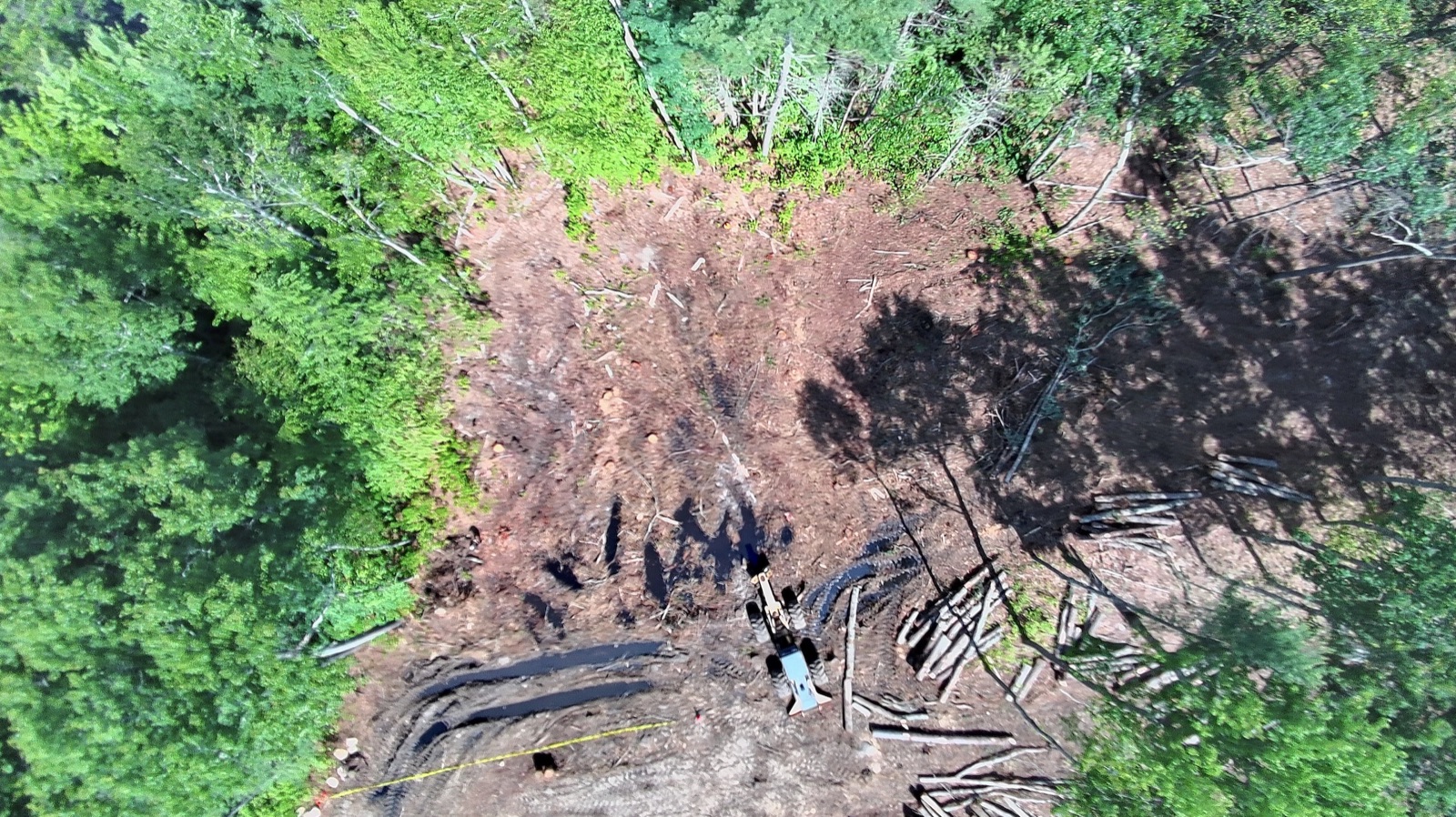 High aerial with all four marker points and water spreading east