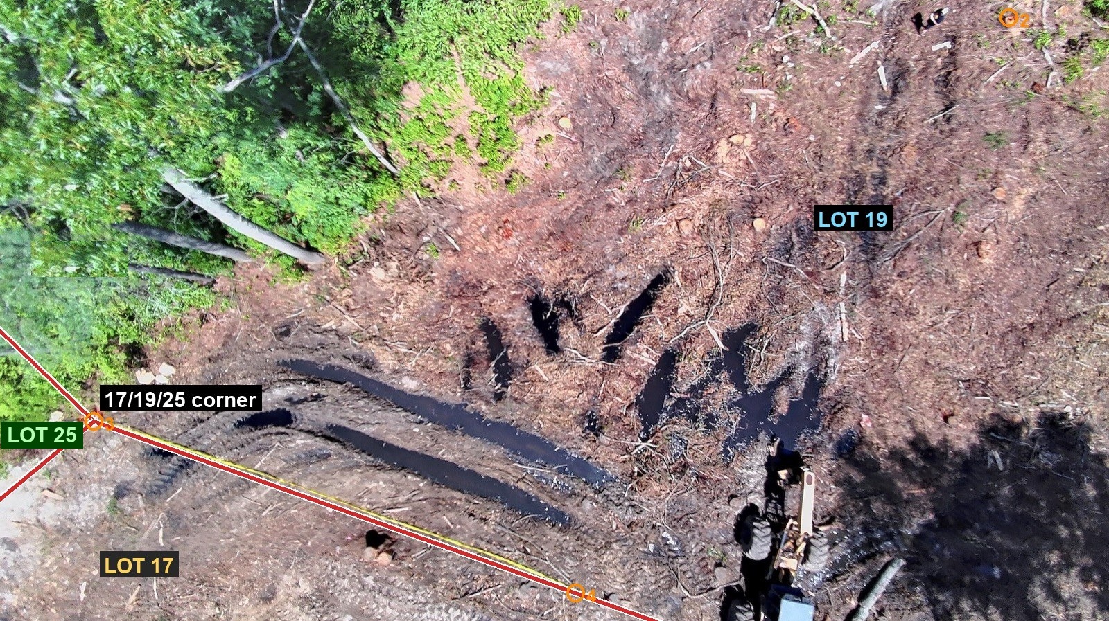 Aerial of the 17/19/25 corner where the property line forks three ways